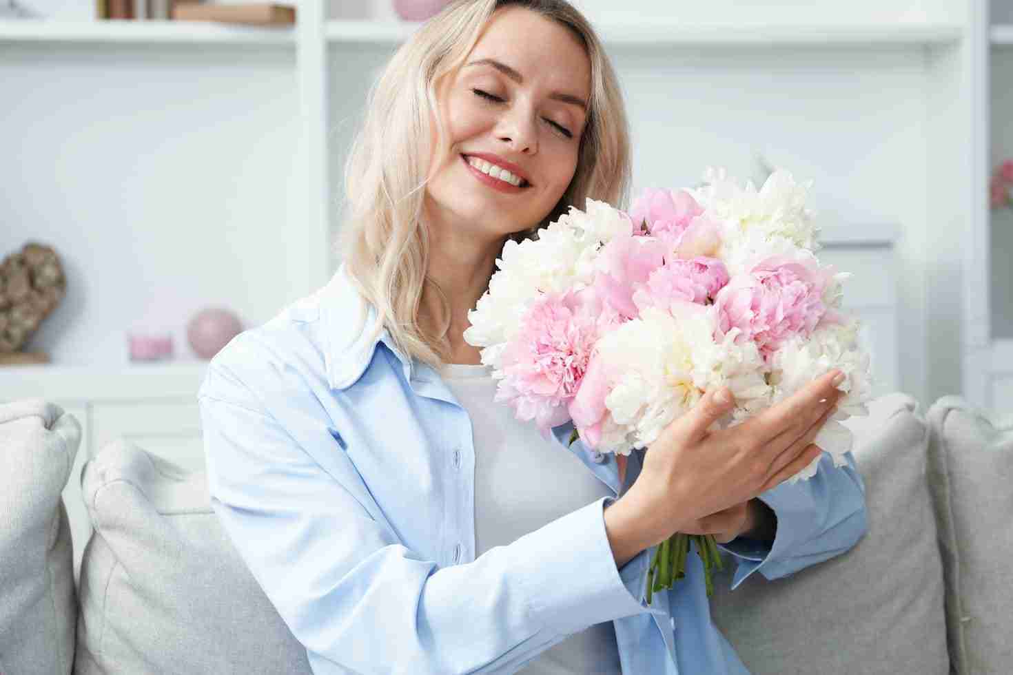woman holding a boquet of flowers