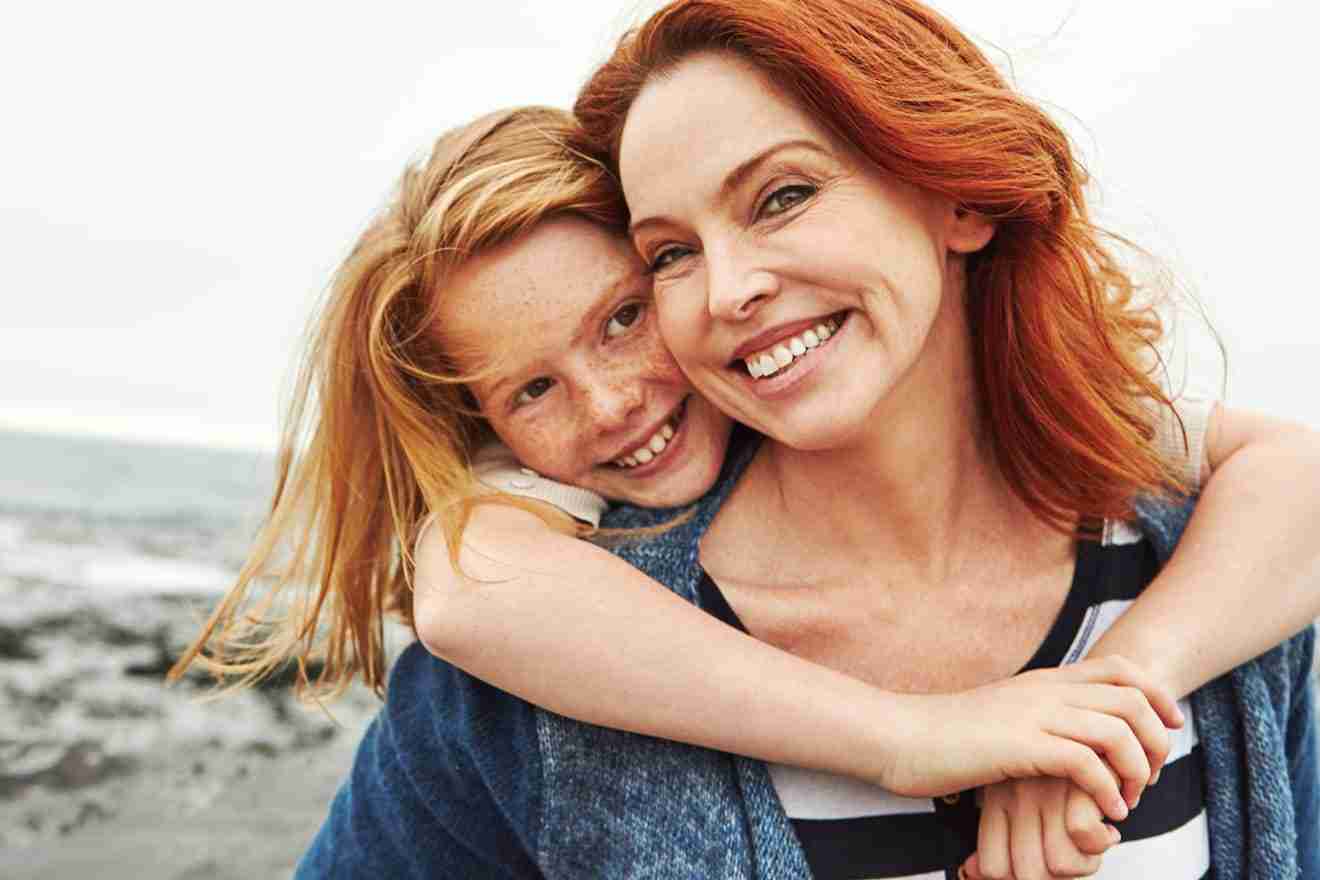woman smiling with daughter
