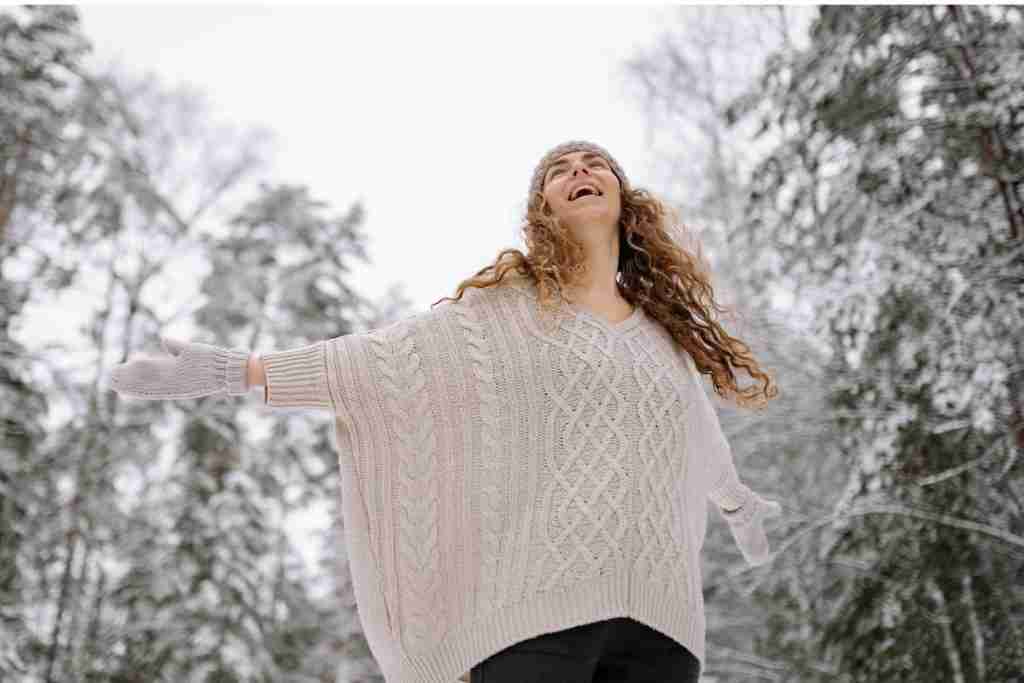 happy woman in snow
