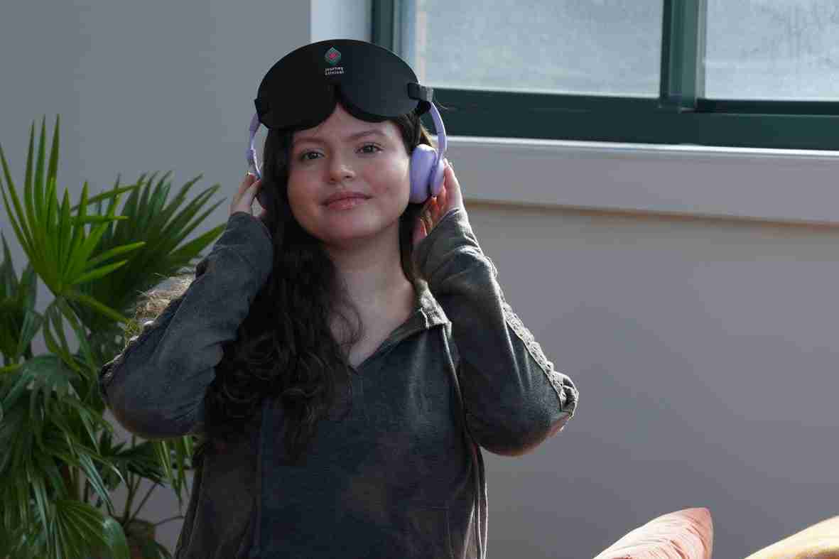 smiling woman with headphones on