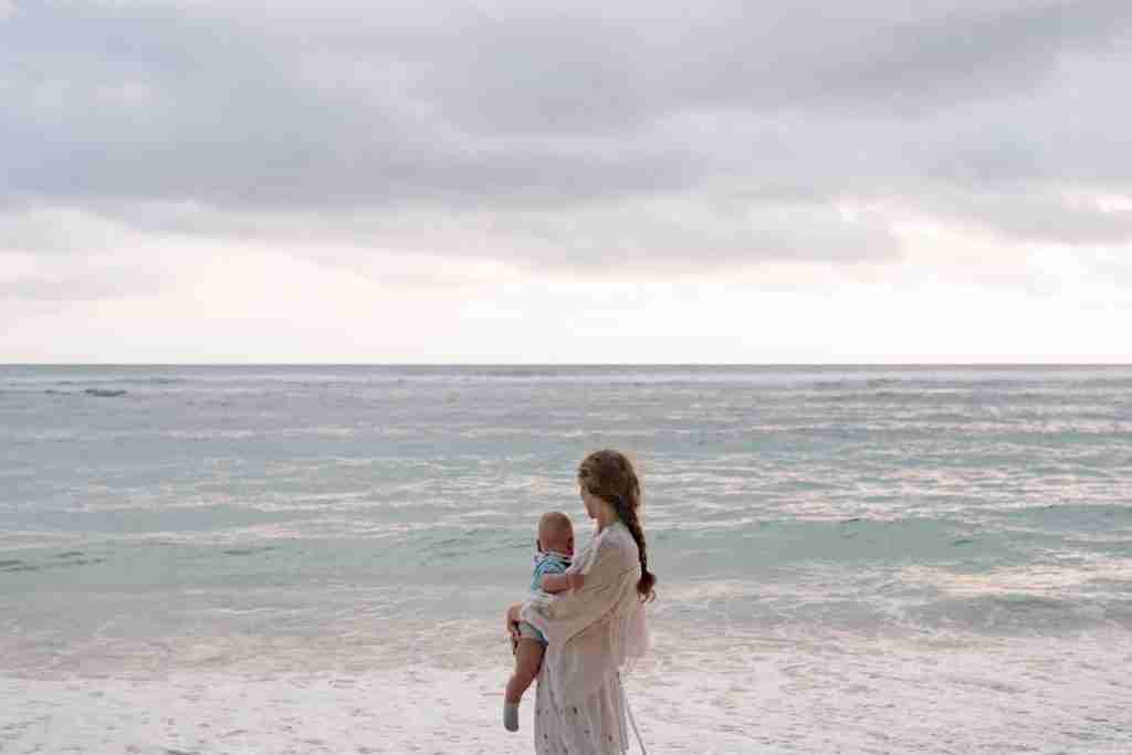 mother and baby at the beach