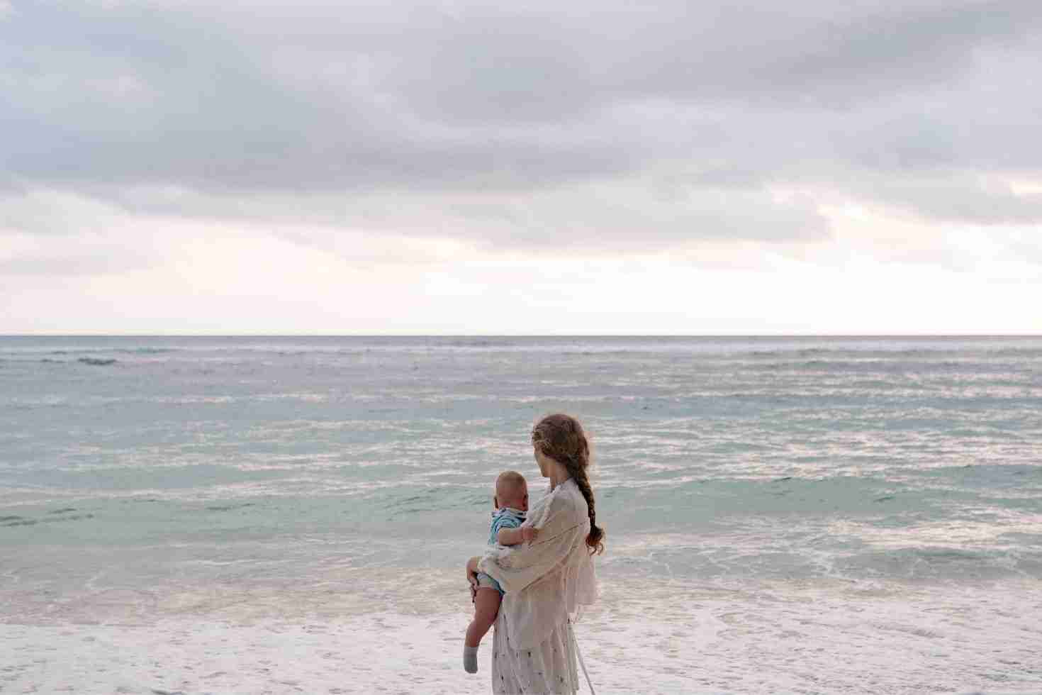 mother and baby at the beach